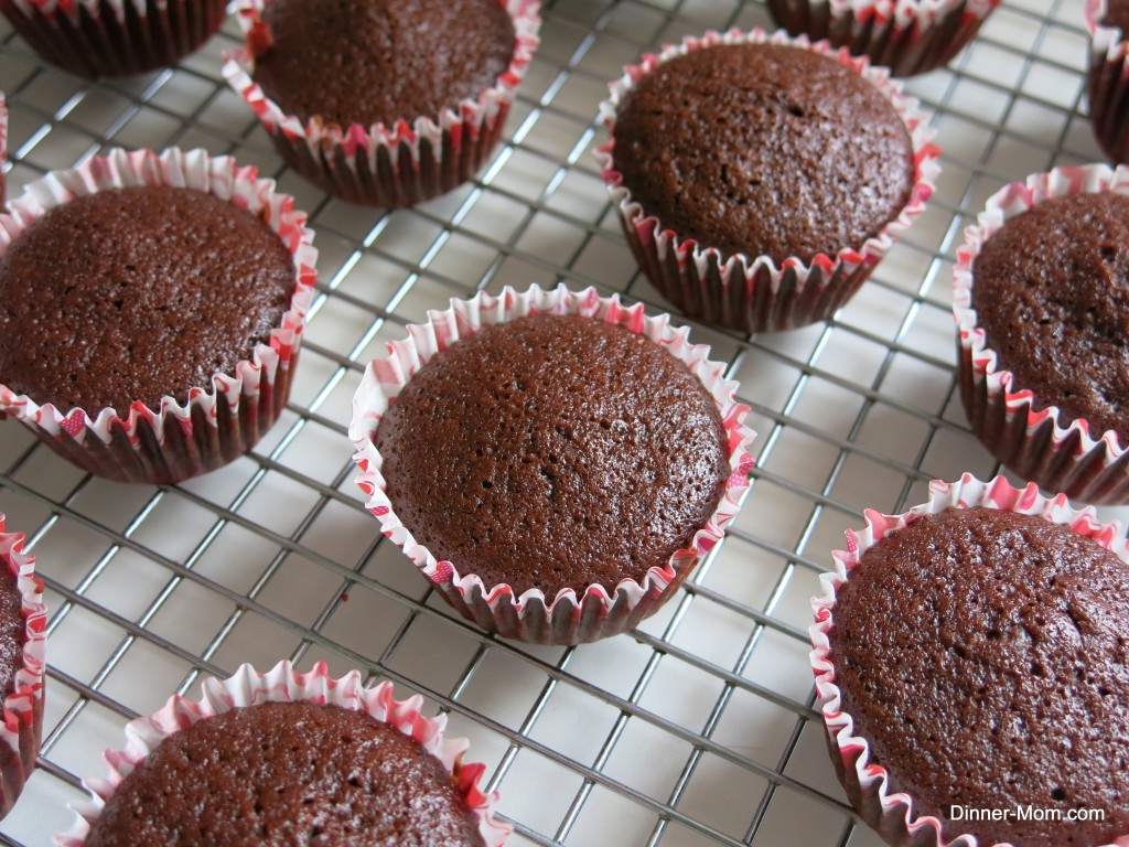 vegan chocolate cupcakes cooling on rack