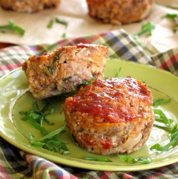 2 Gourmet Meatloaf Muffins with Mozzarella and Sundried Tomatoes on a plate