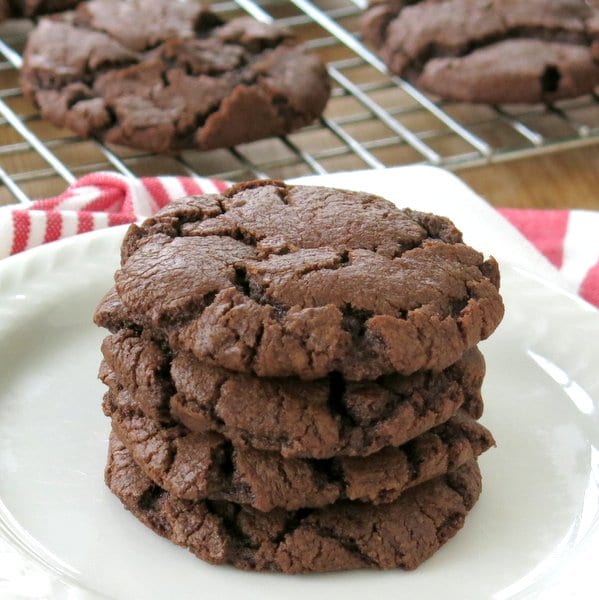 3 Molten Lava Chocolate Chip Cookies stacked on a plate