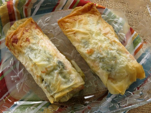 Cooked phyllo wrapped salmon in a baking dish