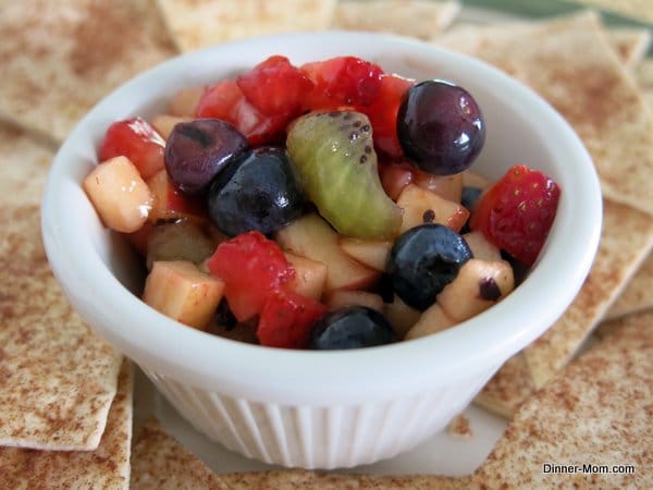 Fruit Salsa in single serve bowl with Cinnamon Chips around it