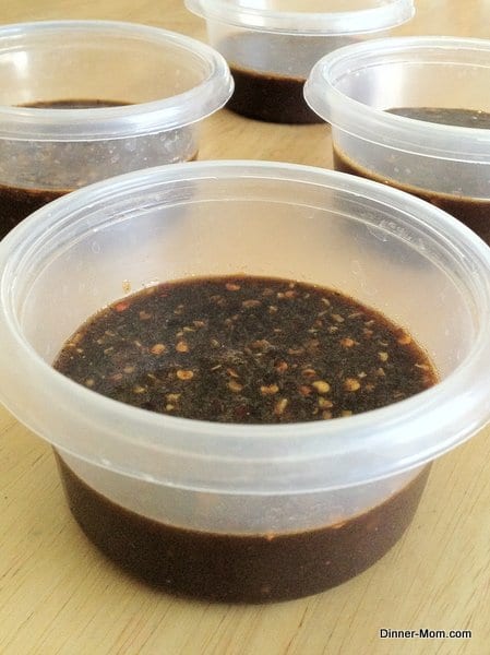 4 small containers of Molasses Marinade for pork chops.