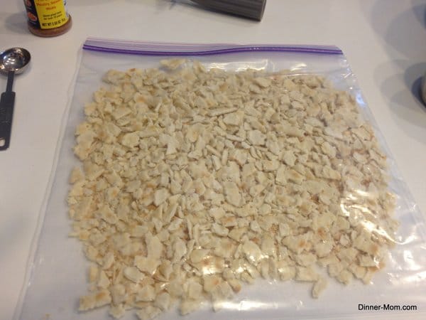 Crushed Saltine Crackers in a plastic bag.