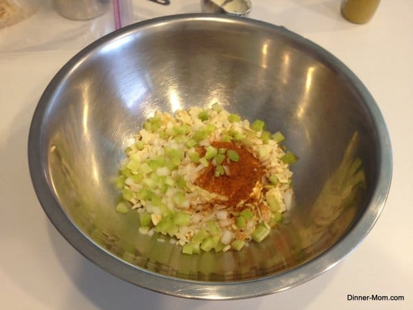 Ingredients for Crab Cakes in bowl, but not combined.