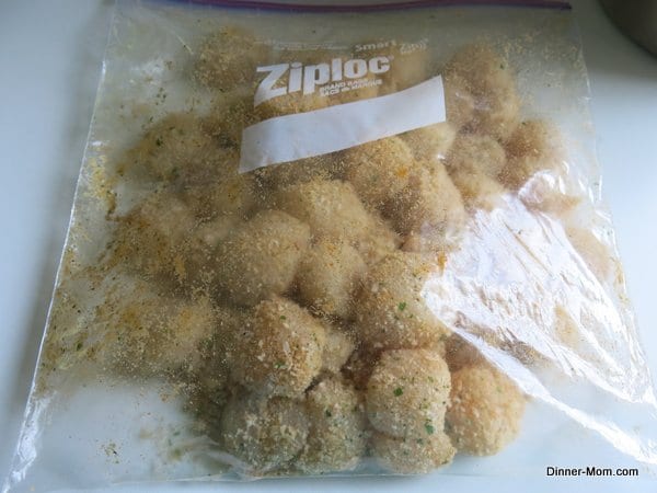 Uncooked scallops ireaded in a plastic bag