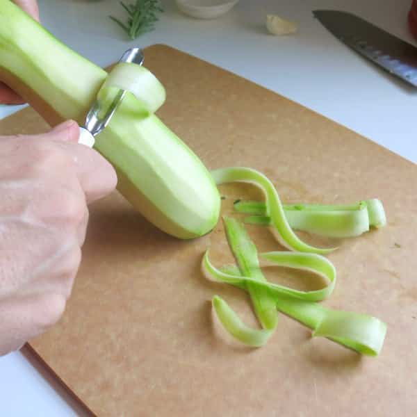 Peeling a zucchini into ribbons