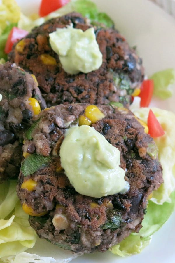 Black Bean Cake Recipe with Avocado Cream on plate