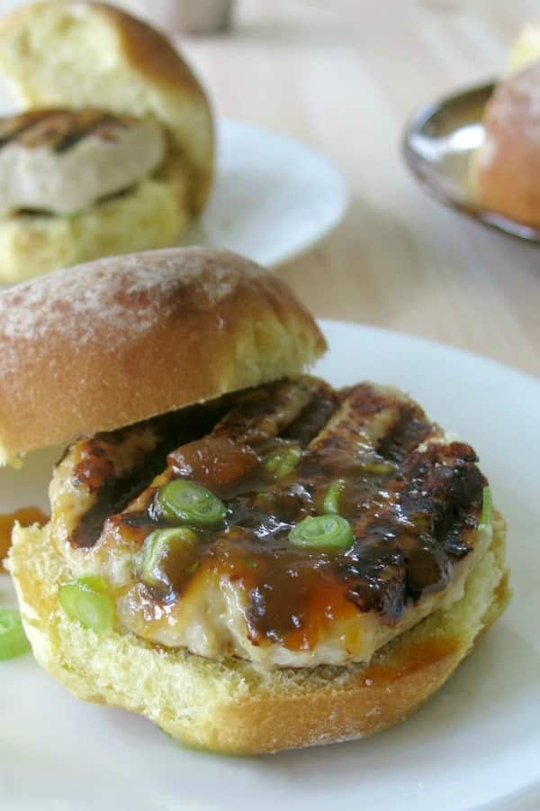 Turkey Burger with mango chutney on plate.