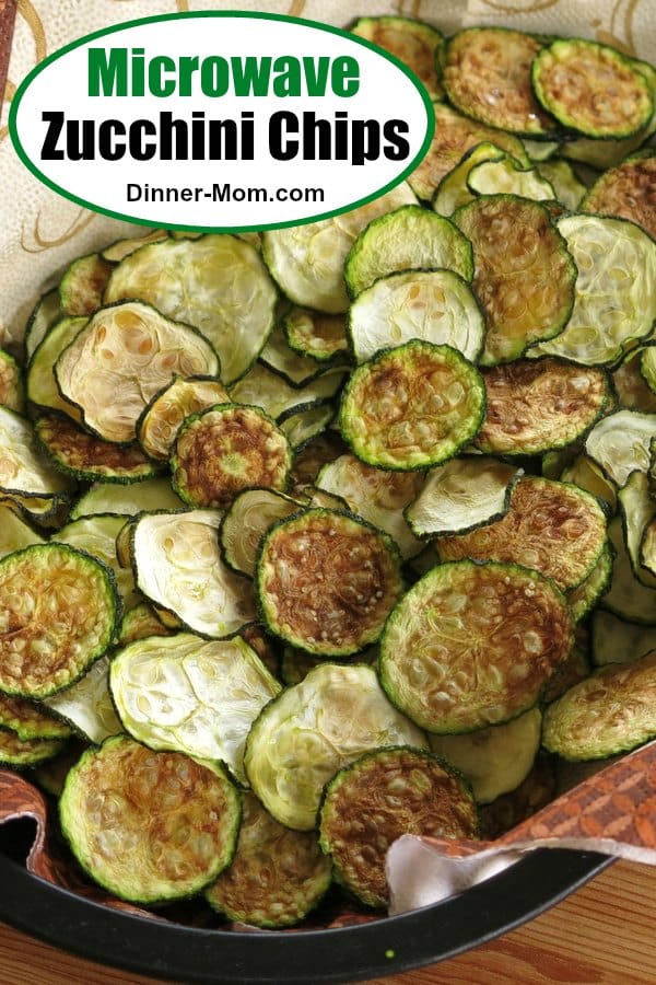 You don't have to wait hours to enjoy this healthy snack..make Zucchini Chips in the microwave. Tips for crispy chips kids and low-carb dieters will love! #zucchinichips #healthysnack