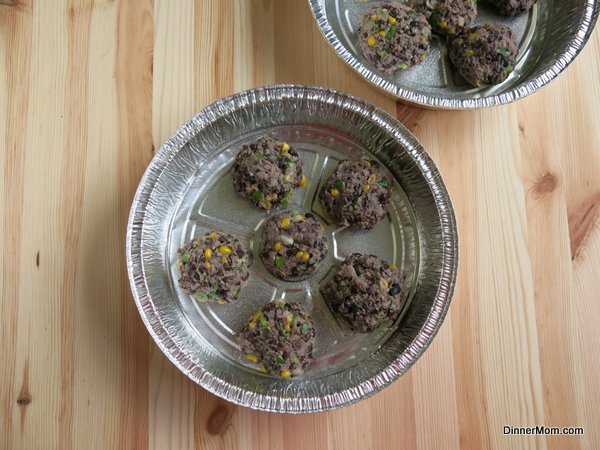 Uncooked Black Bean Cakes in tin