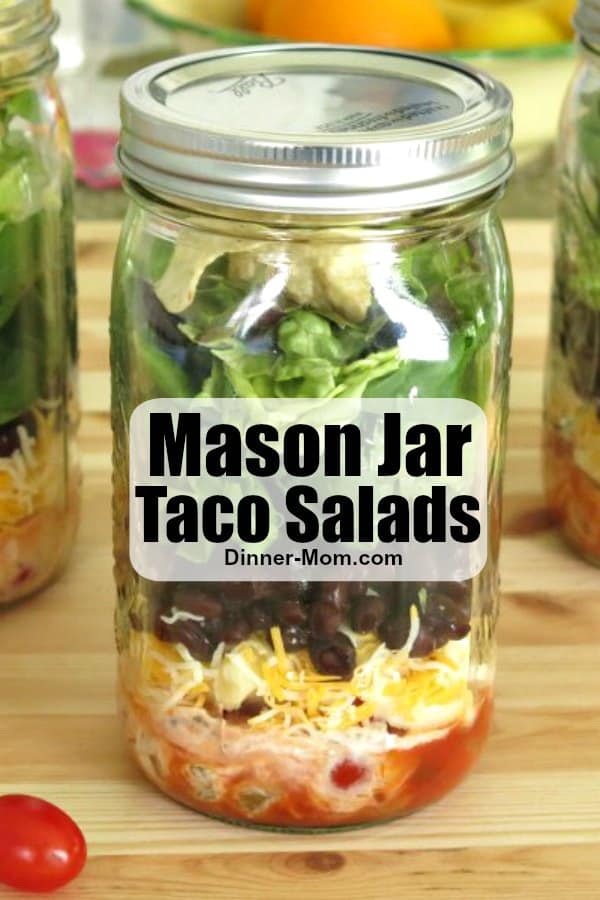 Make Mason Jar Taco Salads with an easy 2 ingredient salsa dressing and every day can be Taco Tuesday! #tacosalad #saladrecipes