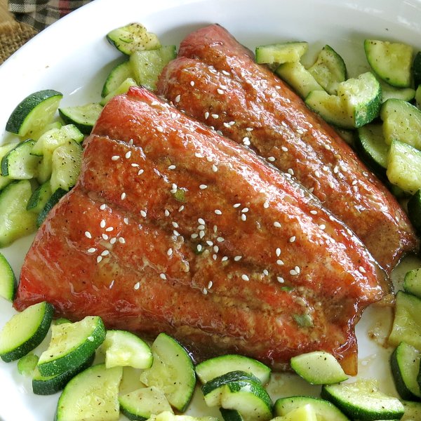 Bourbon Salmon and zucchini in a dish.