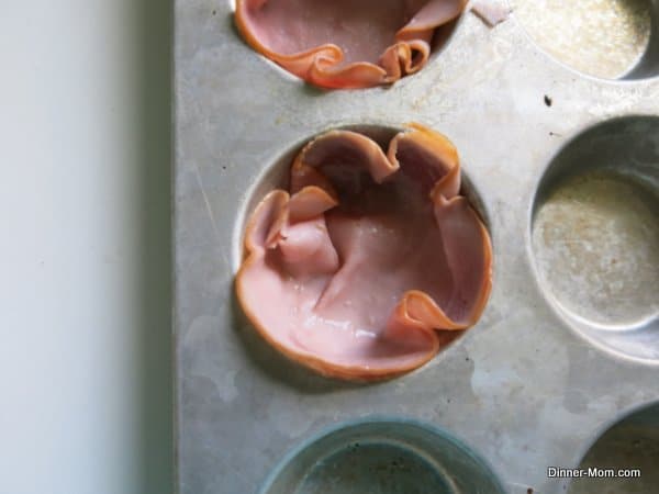 ham in a muffin tin for breakfast quiche cups