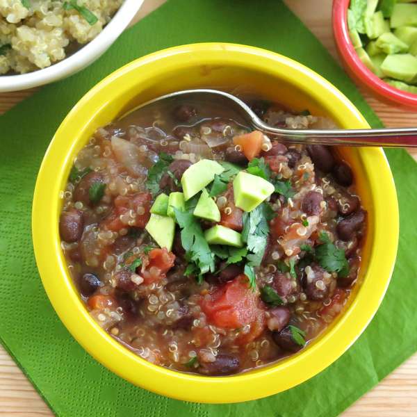 Mexican Black Bean Quinoa Soup Recipe topped with cilantro and avocado