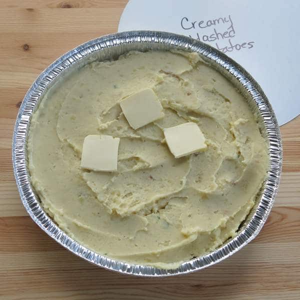 Mashed Potatoes in tin that goes in freezer with lid that is labeled.