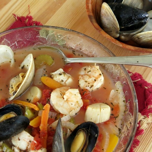 Seafood Cioppino Stew in bowl with spoon