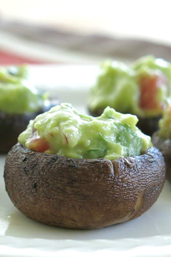 Guracamole Stuffed Mushrooms on a plate