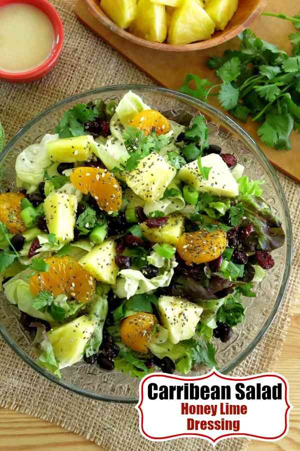 Caribbean Salad with Honey Lime Dressing made famous by Disney’s ‘Ohana restaurant. Pineapple, mandarin oranges, dried cranberries, cilantro, green onions and more will tantalize your taste buds. #saladrecipes #pineapplerecipes #salads #glutenfree
