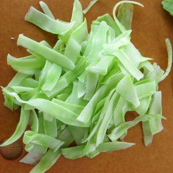 Pile of broccoli stem ribbons.