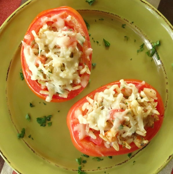 baked stuffed Tomatoes with Rice on plate