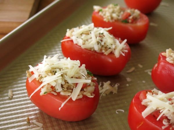 Rice and Sausage Stuffed Tomatoes on baking sheet 