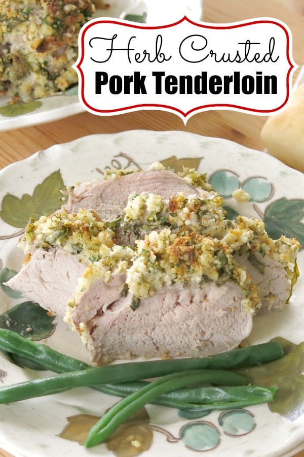 Oven Baked Pork Tenderloin with an irresistible Parmesan cheese and fresh herb crust. It's worthy of a holiday dinner or special occasion worth, but every day easy! #porktenderloin #bakedporktenderloin