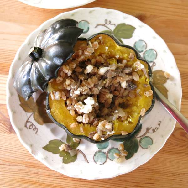 overhead shot of Farro Stuffed Acorn Squash on plate