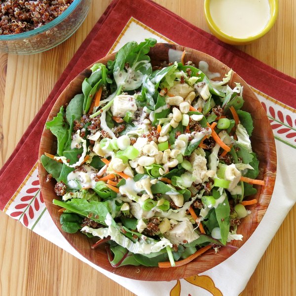 Kale Quinoa Salad with Sesame Aioli Dressing in a bowl.