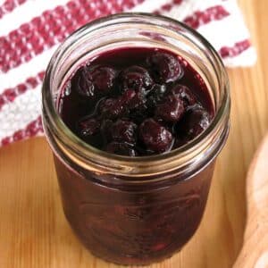 Easy blueberry compote in a mason jar.