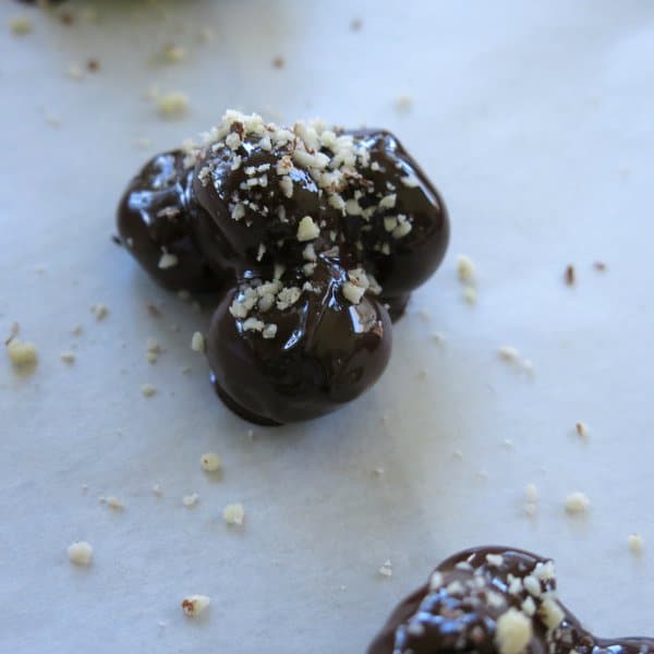 Chocolate Covered Blueberries with Almond topping before they are set in the freezer.