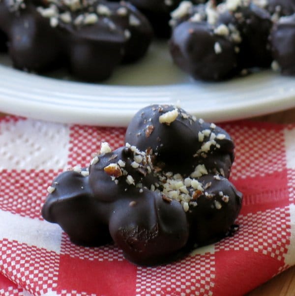 Dark Chocolate Covered Blueberries clustered and dusted with Almonds