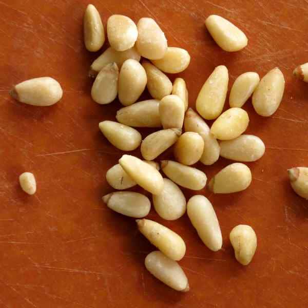 Pine Nuts spread on a cutting board