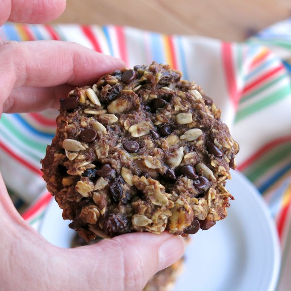 Fingers holding a Healthy Banana Everything Cookie