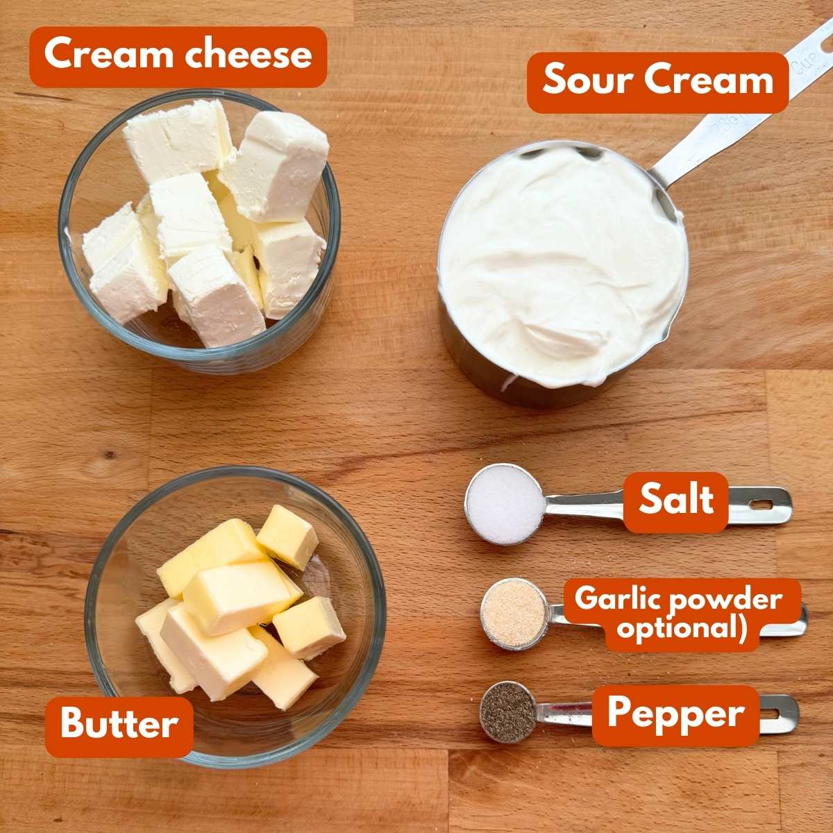 Cream cheese cubes, sour cream, butter cubes, salt, pepper, and garlic powder to make mashed potatoes.