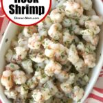 Rock shrimp in a lemon butter garlic sauce in a serving bowl.