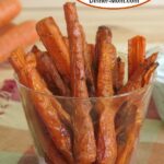 Carrot fries standing in a cup.