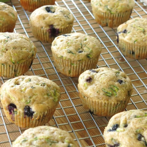 Healthy Zucchini Blueberry Muffins cooling on rack