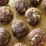 Chocolate Date Balls on a serving board.