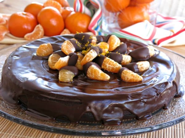 Orange Flourless Chocolate Cake with chocolate dipped clementines on top