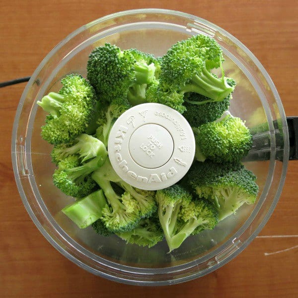 Broccoli florets in a food processor