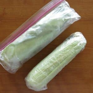 corn on the cob in plastic bag and wrapped in plastic wrap