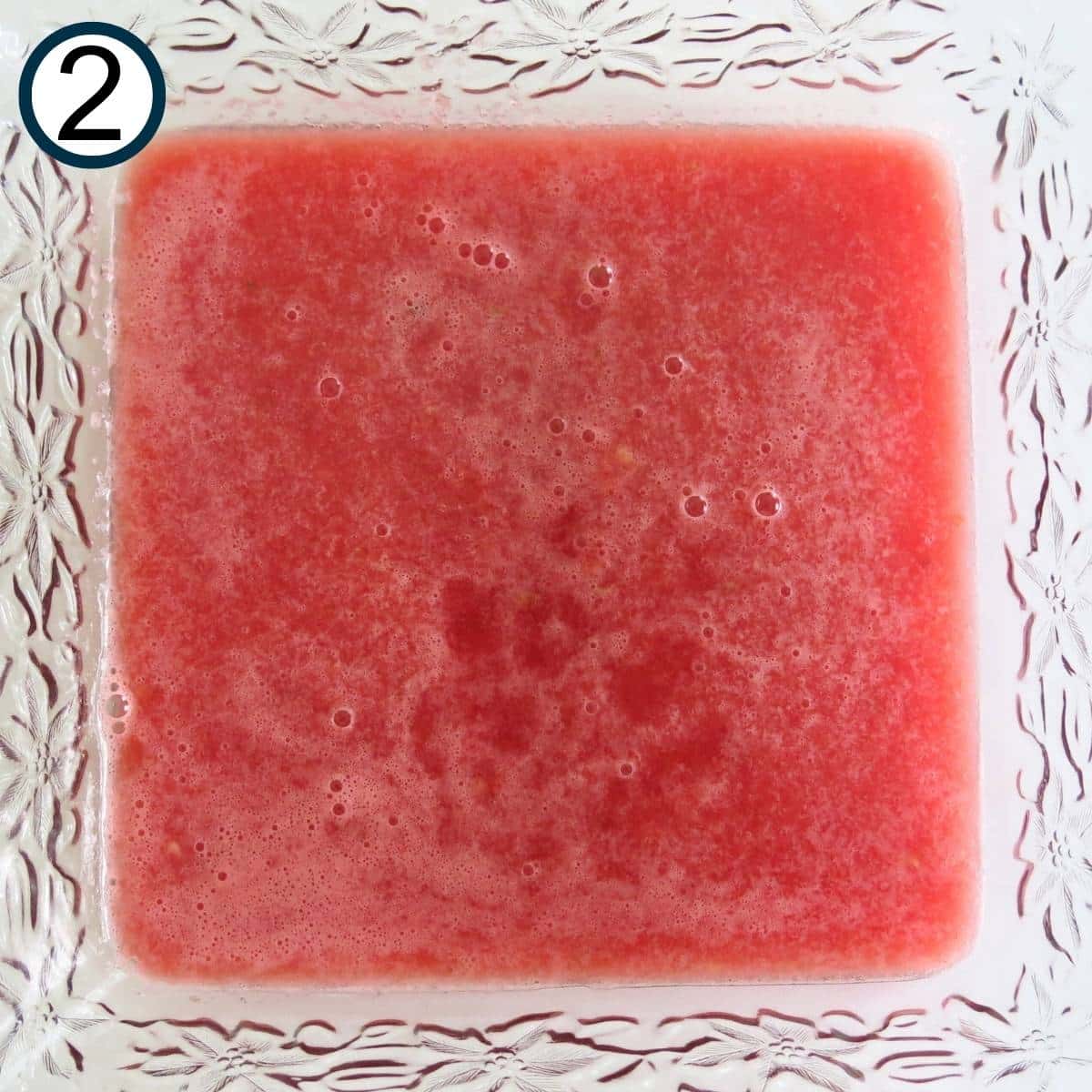 Watermelon puree in a glass dish.