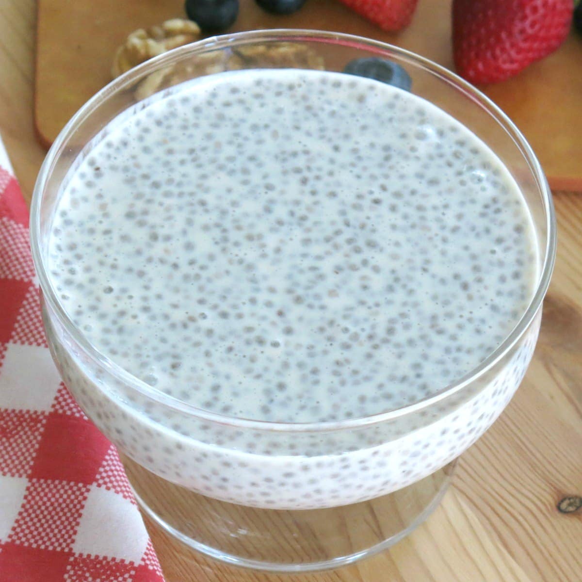 Overnight vanilla chia seed pudding in a glass bowl with no toppings on it.