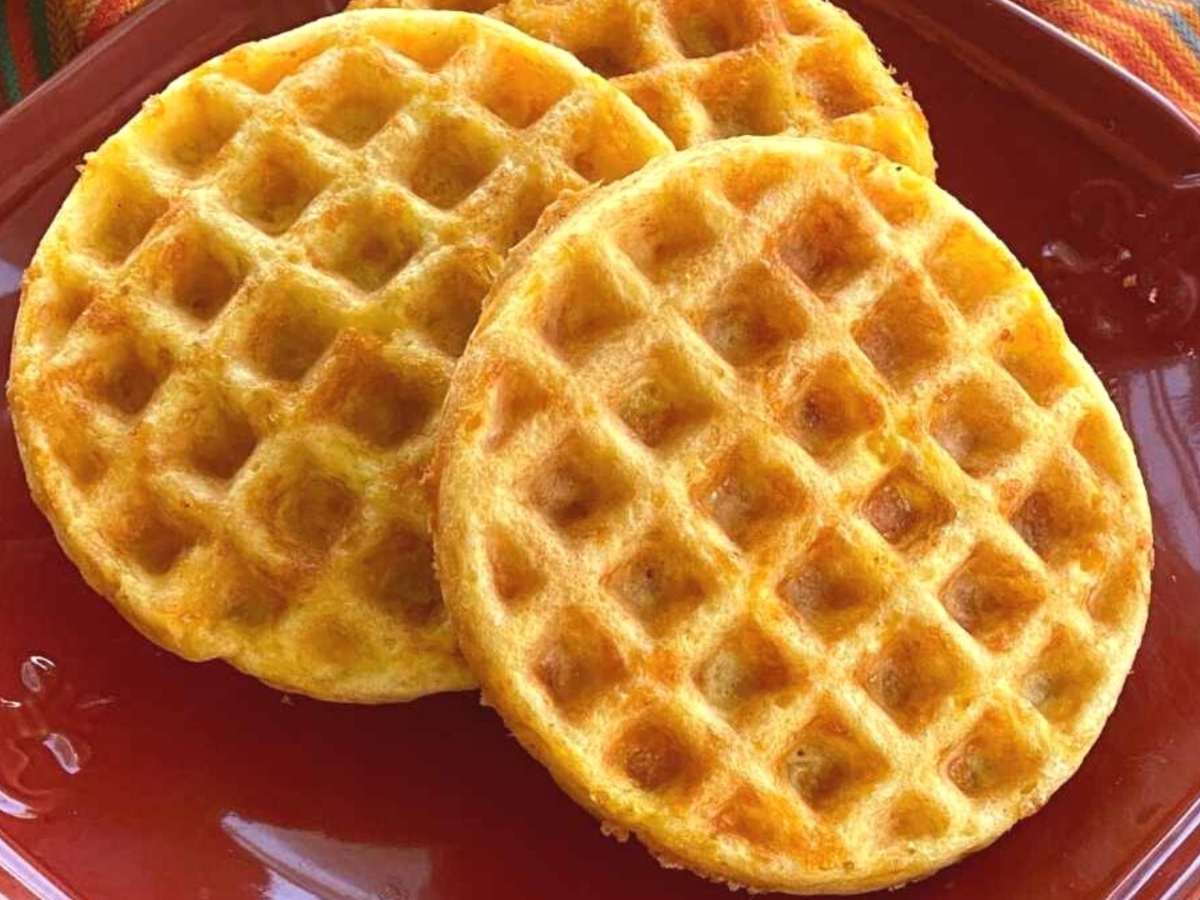 Three low-carb chaffles on a plate.