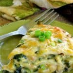 Creamy White Chicken Tortilla Casserole on a dish with a fork.