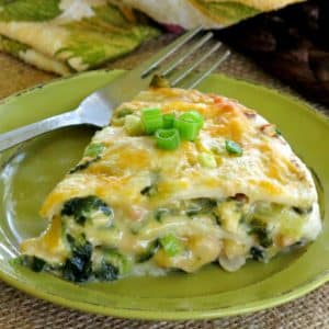 Slice of Creamy White Chicken Enchilada Pie on a plate.