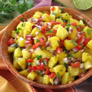 Easy Pineapple Salsa in a large wooden bowl.