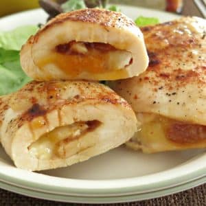Three Mango Chutney Chicken and Brie Roll-ups on a plate.