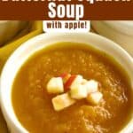 Spicy butternut squash soup with apple in a white bowl.