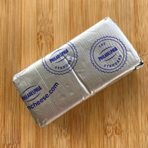Block of cream cheese frozen in original packaging.